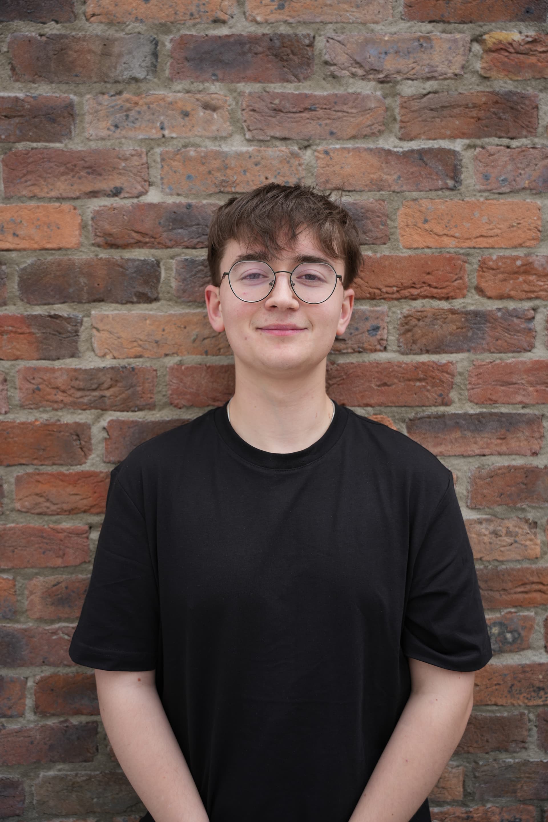Jamie, brick wall